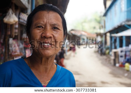CHIN STATE, MYANMAR - JUNE 18 2015: Lady in Falam Centre in the recently opened for tourists Chin State Mountainous Region, Myanmar (Burma)