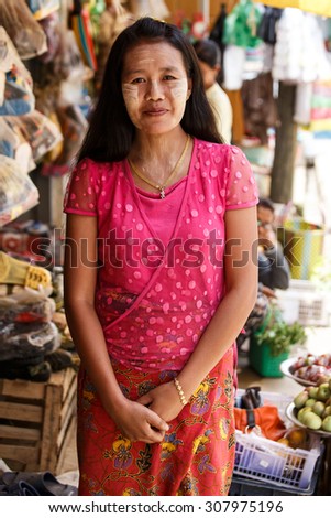 CHIN STATE, MYANMAR - JUNE 18 2015: A lady with thanaka painted face in the Chin State Mountainous Region, Myanmar (Burma)
