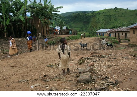 2nd November 2008. Refugees cross from DR Congo into Uganda at the border village of Busanza.