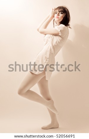 Young beautiful women in white pantyhose with stage make-up, soft colors