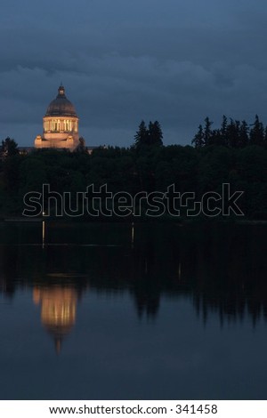 The Washington State capitol building and capitol lake at dusk.