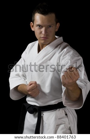 High Contrast karate young male fighter