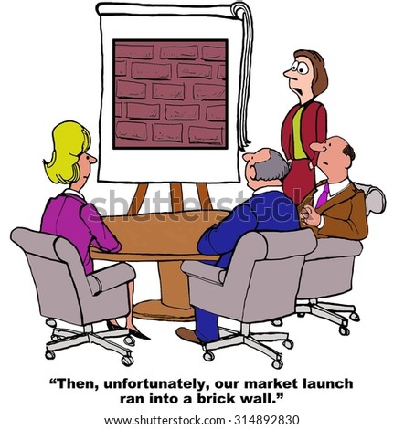 Business cartoon showing businesspeople in a meeting and a chart showing a brick wall.  Businesswoman says, \'Then, unfortunately, our product launch ran into a brick wall\'.