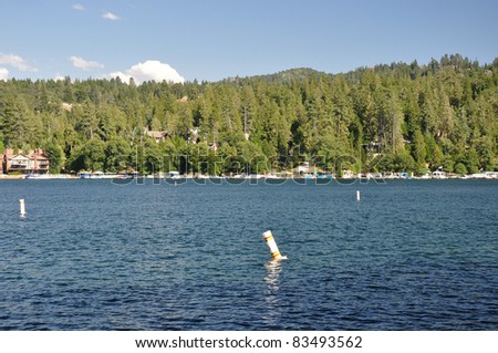 Water buoys mark out areas for boats on Lake Arrowhead in Southern California.