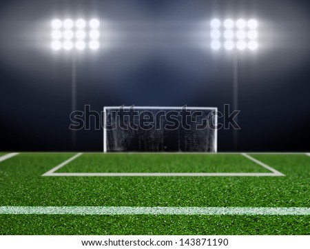 Empty soccer field with spotlights
