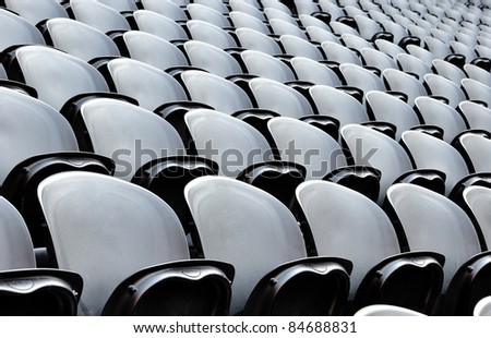 A rows black seats on the stadion. The Donbass Arena (Donetsk, Ukraine) is the first stadium in Eastern Europe designed and built to UEFA elite standards. Arena for semifinals Euro-2012.