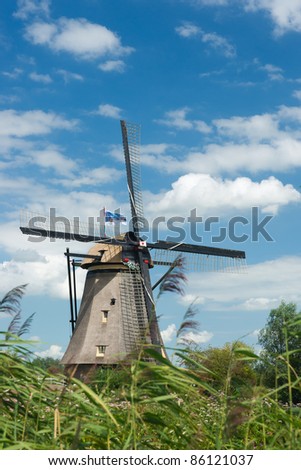 A windmill near Kinderdijk in the Netherlands. Listed as a world heritage by the UN. A must see for tourists in the Netherlands.
