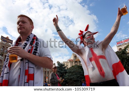 KIEV, UKRAINE - JUNE 15: English football fans have fun in Fan-Zone of Euro 2012 on June 15, 2012 in Kiev, Ukraine. The Ukrainian host cities are Lviv, Donetsk, Kharkiv and Kiev.