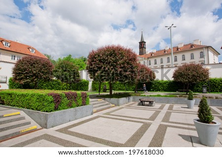 PRAGUE - MAY 16: People sit under the trees in beautiful city park at hot sunny day on May 16 2014 in Czech Republic. Prague receives 4.4 million visitors annually and it is home to 1.3 million people