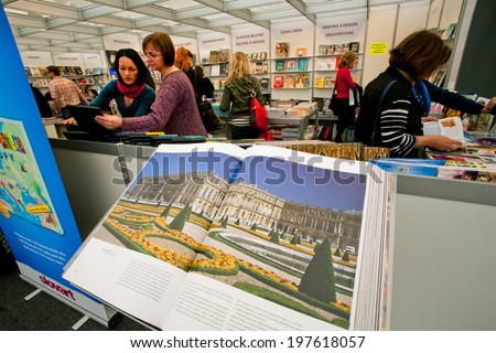 PRAGUE - MAY 16: Many women look at new art books at the indoor book fair on May 16, 2014 in Czech Republic. Fourteenth-largest city in the European Union, Prague is home to 1.3 million people