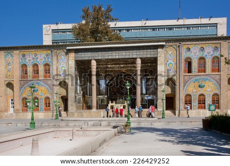 TEHRAN, IRAN - OCTOBER 6: Group of tourists walking around the Golestan Palace inside urban city on October 6, 2014. The old, world heritage Golestan Palace was rebuilt to its current form in 1865