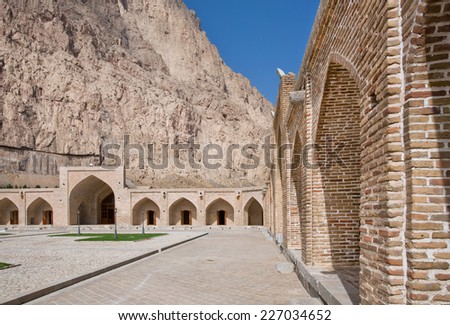 Brick walls and arches of the caravanserai in the high mountains of Middle East
