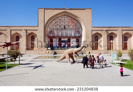 ISFAHAN, IRAN - OCT 14: Family goes to the Museum of Natural History with an exhibition about dinosaurs on October 14, 2014. Third largest city in Iran, Isfahan is example of Iranian & Islamic culture
