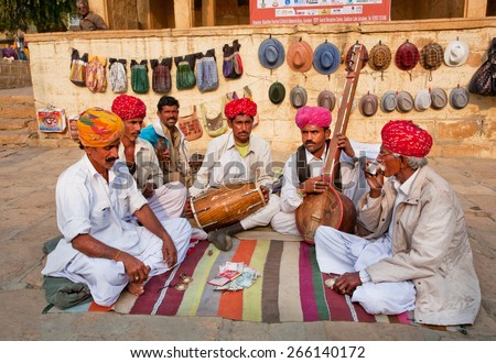 JODHPUR, INDIA - JAN 28: Elderly men in turbans ready to play traditional music on the city street on January 28, 2015. Jodhpur, with population 1,290,000 people, is a center of Marwar region of India