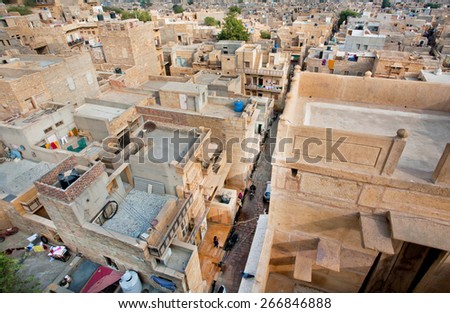 JAISALMER, INDIA - MAR 1: High point view on the streets of poor area in historical indian town on March 1, 2015. Jaisalmer lies in the heart of the Thar Desert and has a population of about 78,000.