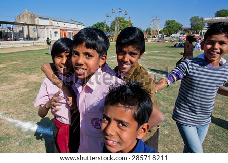 NAWALGARH, INDIA - FEB 6: Unidentified boys jumping on the yard of indian village school on February 6, 2015 in Rajasthan. With population of 100000, Nawalgarh is education center of Shekhawati area