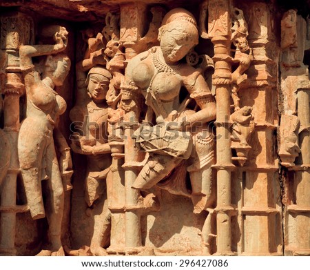CHITTORGARH, INDIA - FEB 15: Woman beats the drum on the front of Hindu temple on February 15, 2015. Chitaurgarh has population about 117,000 and the largest fort in Rajasthan