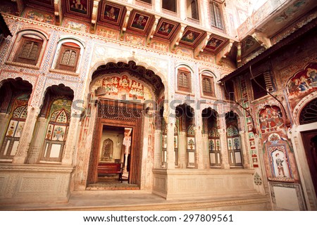 MANDAWA, INDIA - FEB 7: Historical mansion Havely with carved walls in artistic style  on February 7 2015 in Rajasthan. With population of 21000, Mandawa is popular site with naive art Havelis homes
