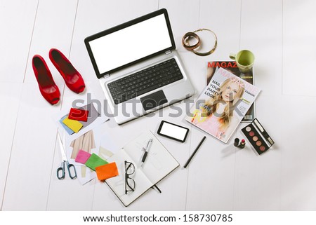 Still life of a fashion creative space. /  Overhead of a essentials objects in a fashion blogger