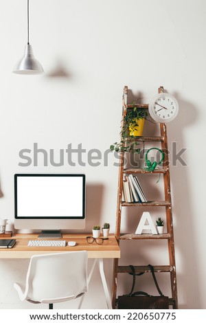 Industrial workspace with computer. / Minimal office on white background.