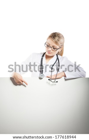 medical doctor woman smile with stethoscope hold blank card board showing hand open palm, concept advertisement product, empty copy space over white background