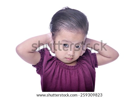 Closeup portrait, covering closed ears, annoyed by loud noise or ignoring someone, not wanting to hear their side of story, isolated white background. Negative emotion