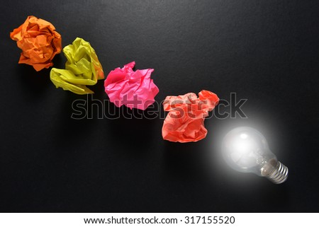 great idea concept with crumpled colorful paper and light bulb