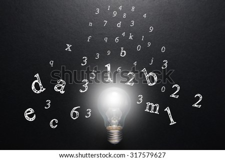 great idea concept with numbers and letters and light bulb on black background