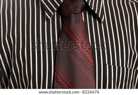 close up shot of a businessman wearing shirt and neck tie
