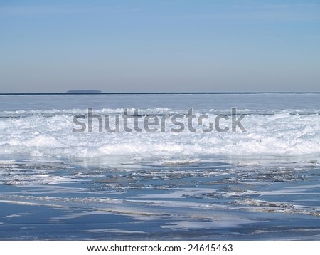 Ice floe on Lake Erie with view of West Sister Island