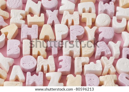 Letter candies spelling out the words Happy Birthday