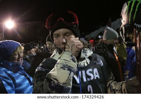 PARK CITY, UTAH - JAN 18, 2014 American halfpipe skier Aaron Blunk cries after winning third place during the Olympic qualifying event in Park City, Utah on January 18th, 2014.