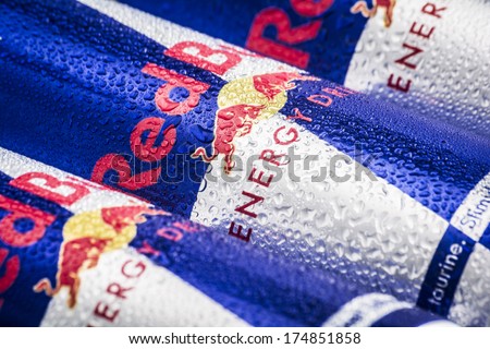 HILVERSUM, NETHERLANDS - FEBRUARY 04, 2014: Red Bull is an energy drink sold by Austrian company Red Bull GmbH, created in 1987. Red Bull is the most popular energy drink in the world.