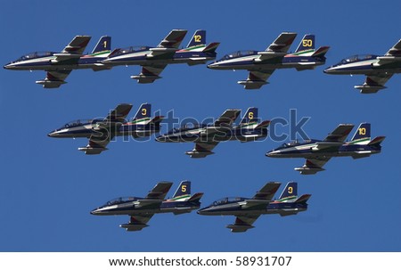 KECSKEMET, HUNGARY - AUGUST 8: Italian demoteam Frecce Tricolori, flying in formation at Airshow August 8, 2010 in Kecksemet, Hungary