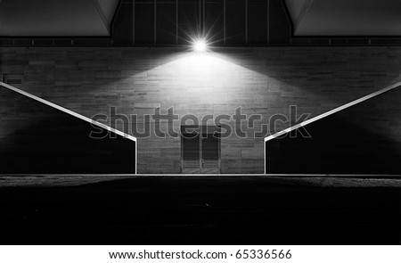 Iron door in a dark alley,black and white