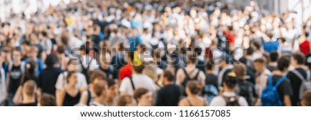 Similar – Image, Stock Photo large crowd of anonymous blurred people walking in a modern hall