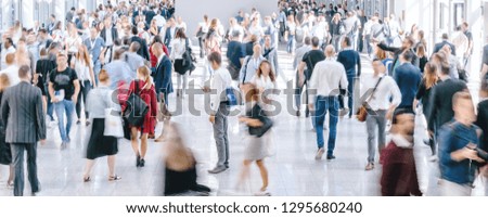 Similar – Image, Stock Photo large crowd of anonymous blurred people walking in a modern hall