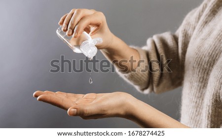Similar – Image, Stock Photo doctor man using alcohol disinfectant gel. using protective mask and gloves during corona virus covid 2019 pandemic. Health care and medical concept