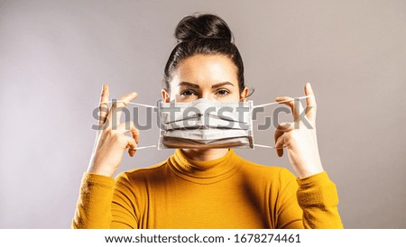 Woman wearing an anti virus protection mask to prevent others from corona COVID-19 and SARS cov 2 infection Photo stock © 