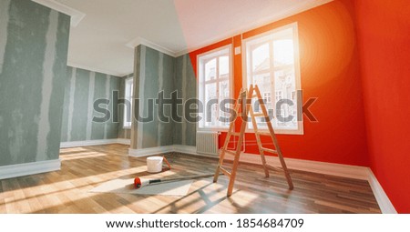 Painting wall red in room before and after restoration or refurbishment Foto stock © 