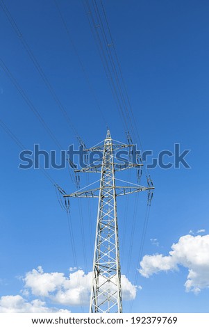 electricity Pylon on blue sky with clouds electricity costs power cable