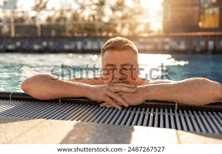 Similar – Image, Stock Photo A man swimming and diving in the water