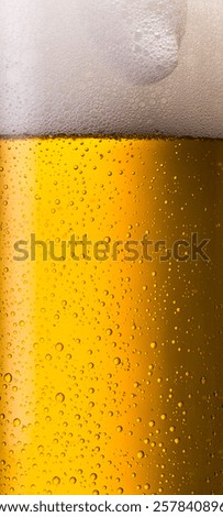 Similar – Image, Stock Photo A fresh beer (Kölsch) is tapped at the tap in a bar