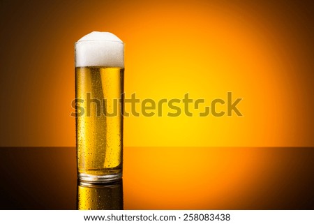 Similar – Image, Stock Photo A fresh beer (Kölsch) is tapped at the tap in a bar