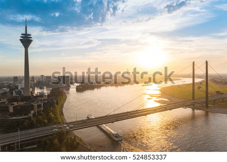 Similar – Foto Bild Blick auf die Düsseldorfer Skyline bei Sonnenuntergang