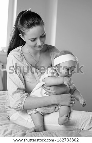 Mother and Baby hugging. Happy Family. Black and White