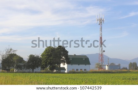 A microwave communications tower in a rural setting/Microwave Telecommunications Tower/A tower in a rural setting used for telecommunications.