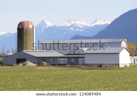 A silo and farm buildings/Silo and Farm Buildings/Various buildings and silo typical of a modern farm business.