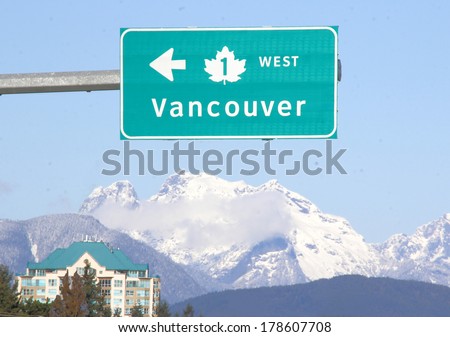A sign directs motorists to Vancouver, British Columbia/Vancouver Signage/A sign directs travelers to Vancouver, Canada.