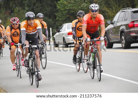 ALDERGROVE, BC/CANADA - AUGUST 16: 1400 cyclists crossing the border enjoy a two day ride from Seattle to Vancouver during the 33rd annual RSVP Cycling Tour on August 16, 2014.